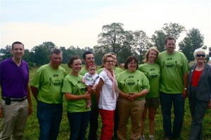 The host farm family is shown with Ministers John Milloy, Elizabeth Sandals and Premier Kathleen Wynne. The farmers include, from left, James Johnston; Mary Anne, Nadine and Joe Doré; Claire, Frances, Amanda and Graham Johnston.